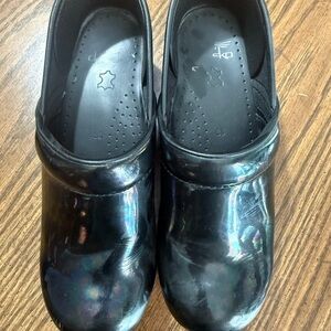 Dansko Black Iridescent Clogs